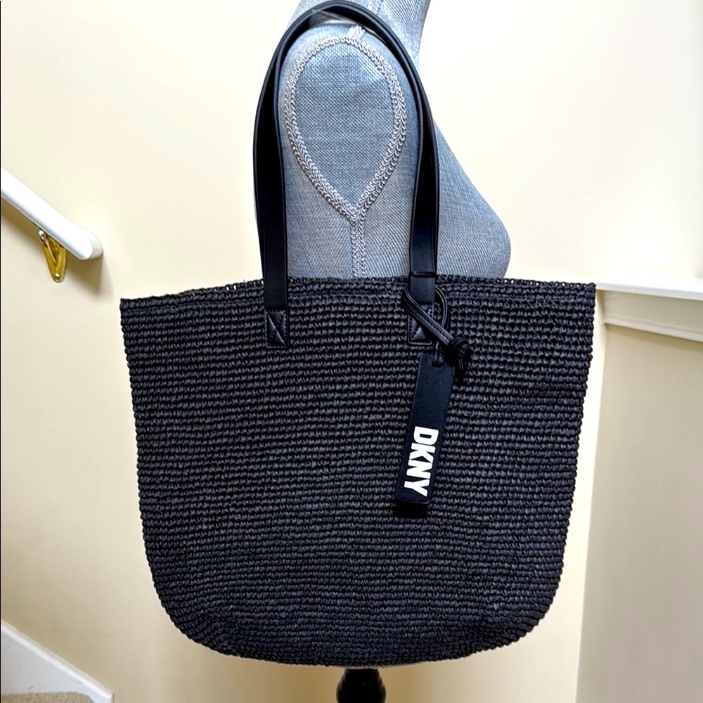 New DKNY Cali Black Woven Tote Bag. Black handles with logo DKNY tag.